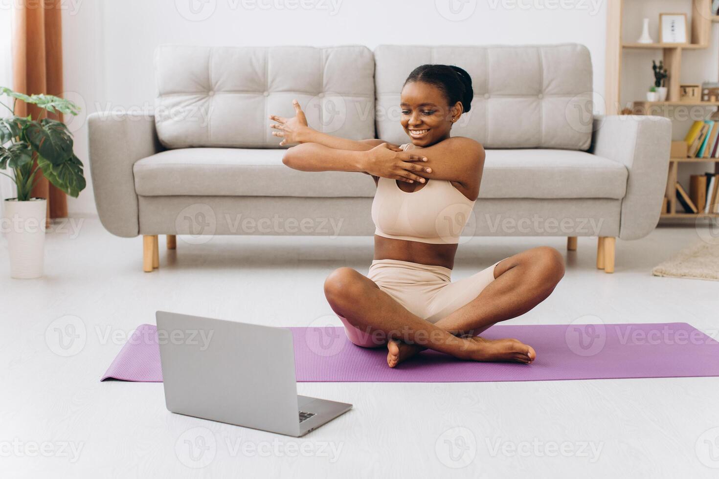 Domestic Workout. Young Sporty Black Woman Doing Plank Exercise At Home, Training In Living Room photo
