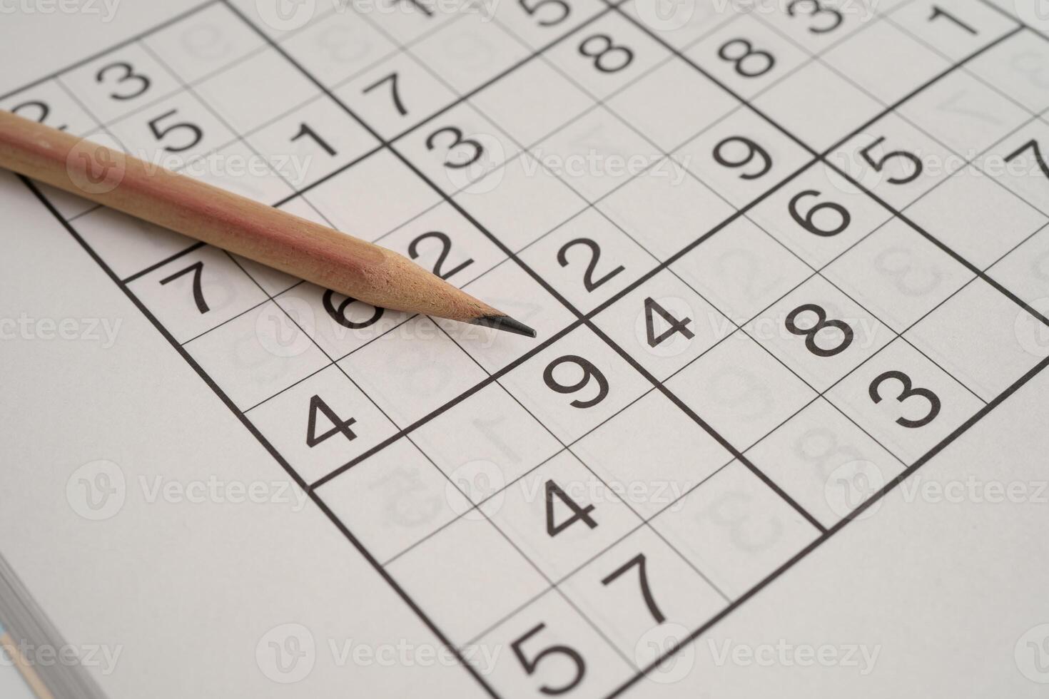Sudoku puzzle, game to play for keep you brain younger for developing Alzheimer disease in senior patient. photo