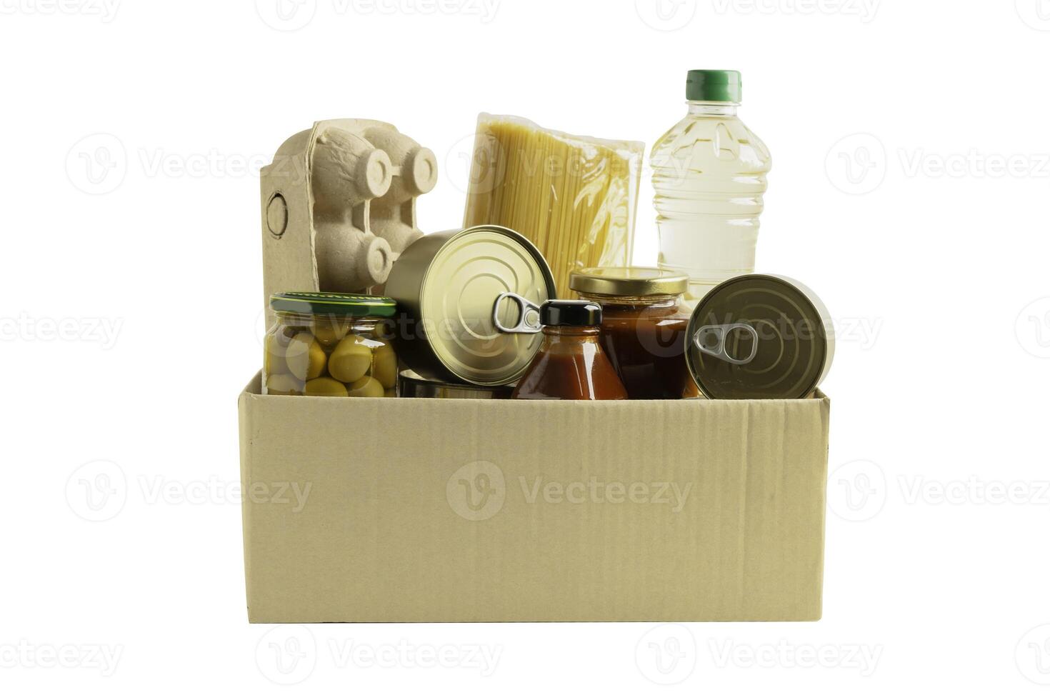 Foodstuff for donation isolated on white background with clipping path, storage and delivery. Various food, pasta, cooking oil and canned food. photo