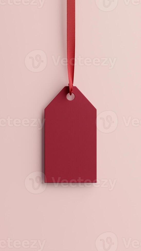 Rectangular red blank paper tag label price tag with hanging satin rope isolated pink photo