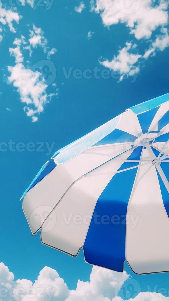 Umbrella blue and white beach for sunburn protection and blue sky bottom view photo