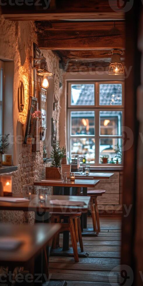 Cozy ambiance in an empty restaurant at twilight with warm lighting photo
