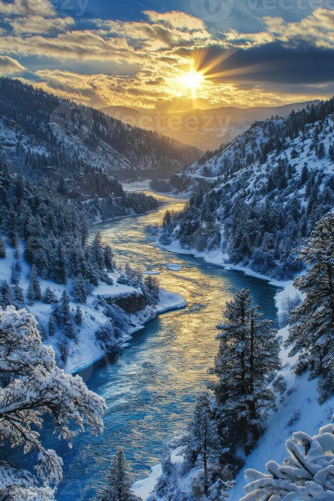 Majestic river valley at sunrise with snow-covered trees and mountains photo