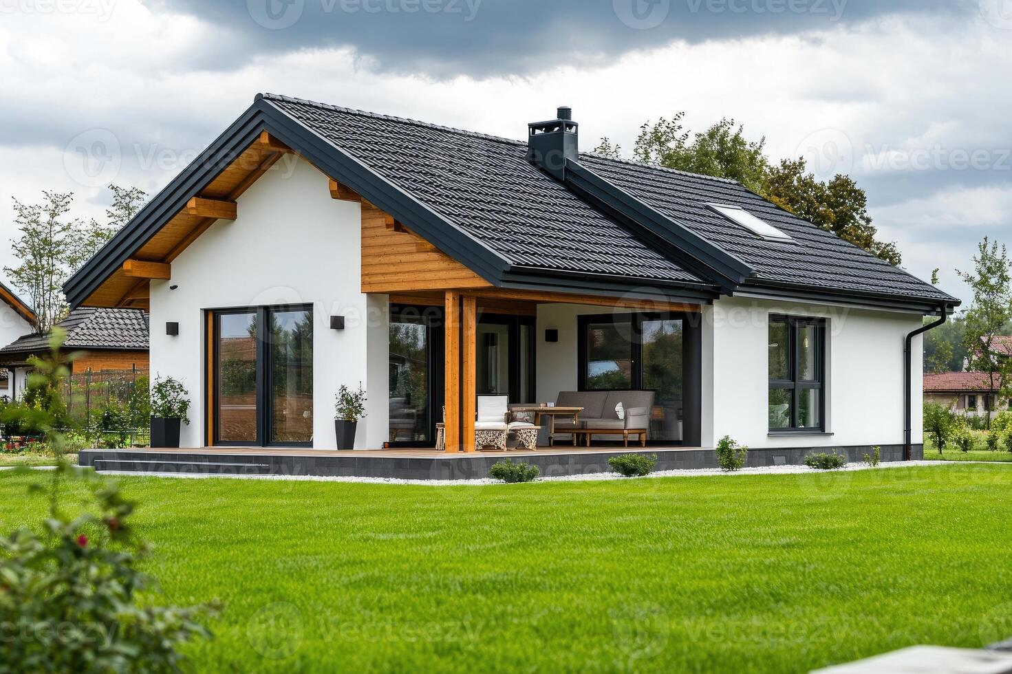 Modern white house with covered patio enjoying the summer sun photo
