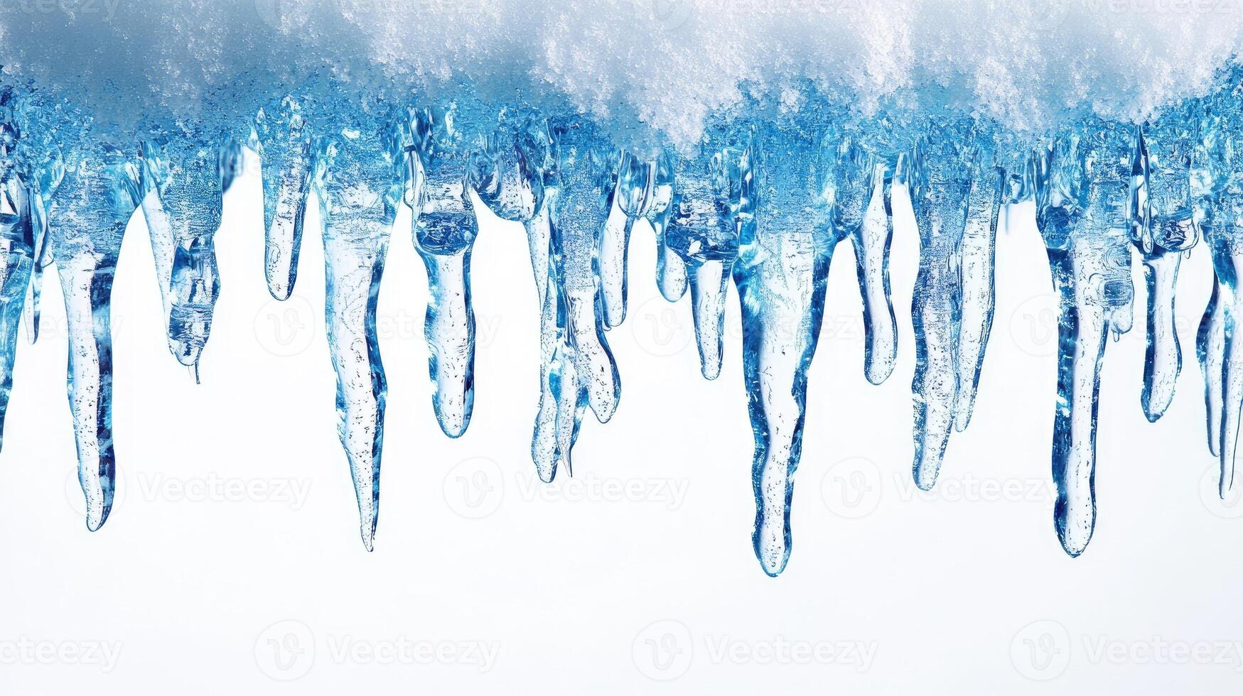 Sharp icicles hanging from roof covered with snow melting in springtime photo
