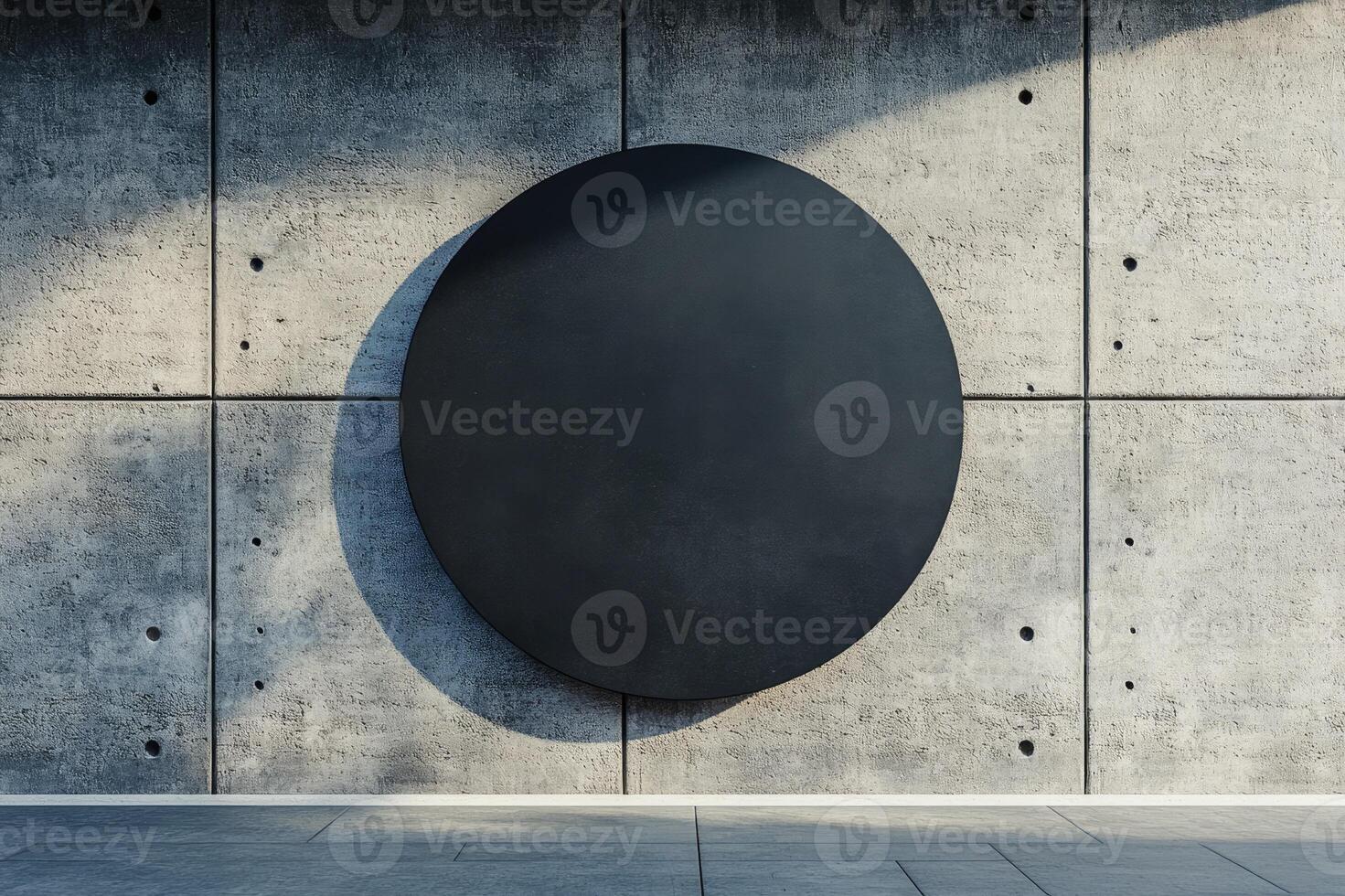 Black circle mockup leaning on concrete wall in minimal gallery photo