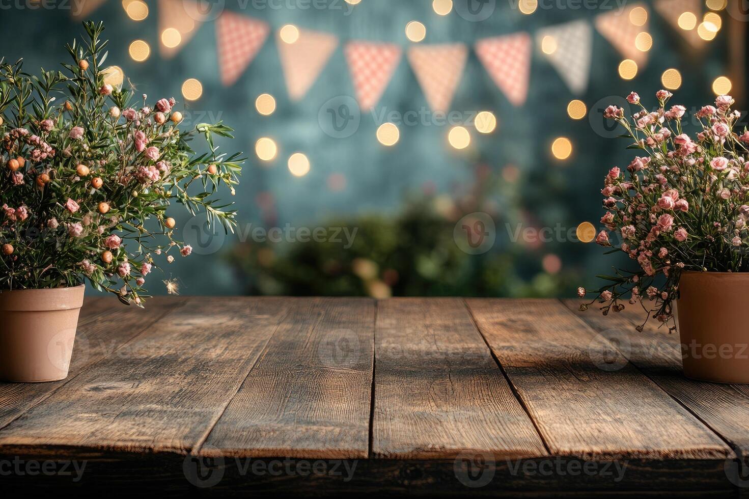 Wooden table presenting something with christmas lights and decorations hanging behind photo