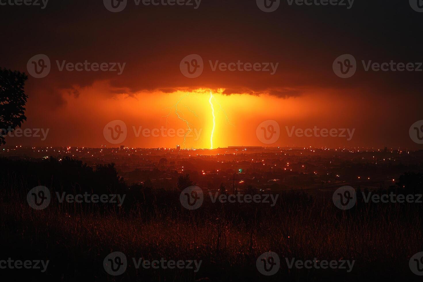 Lightning striking city skyline during powerful thunderstorm photo