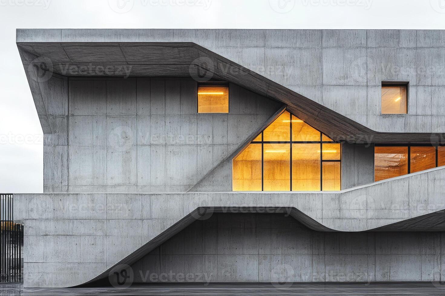 Modern concrete building reflecting in water at dusk photo