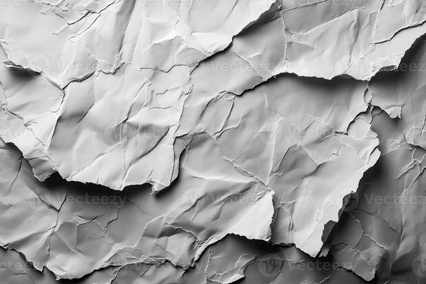 Crumpled paper is providing a textured background surface photo