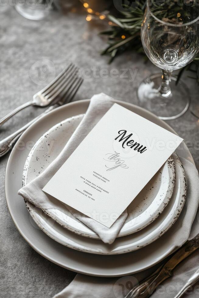 Elegant menu lying on plates at restaurant table setting photo
