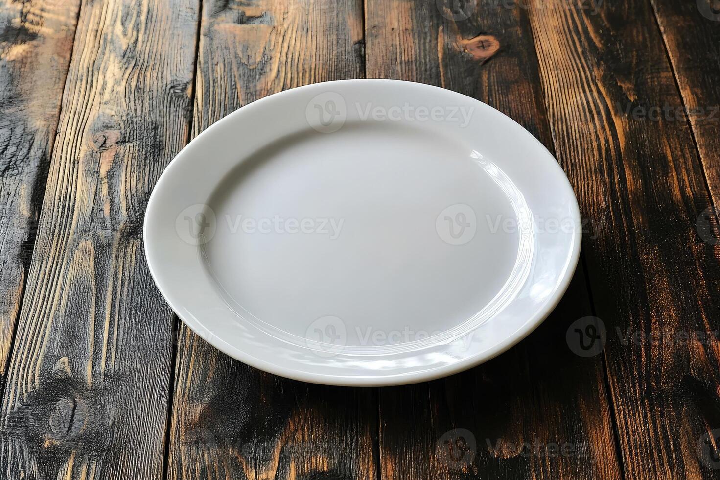 White empty plate on a rustic wooden table photo