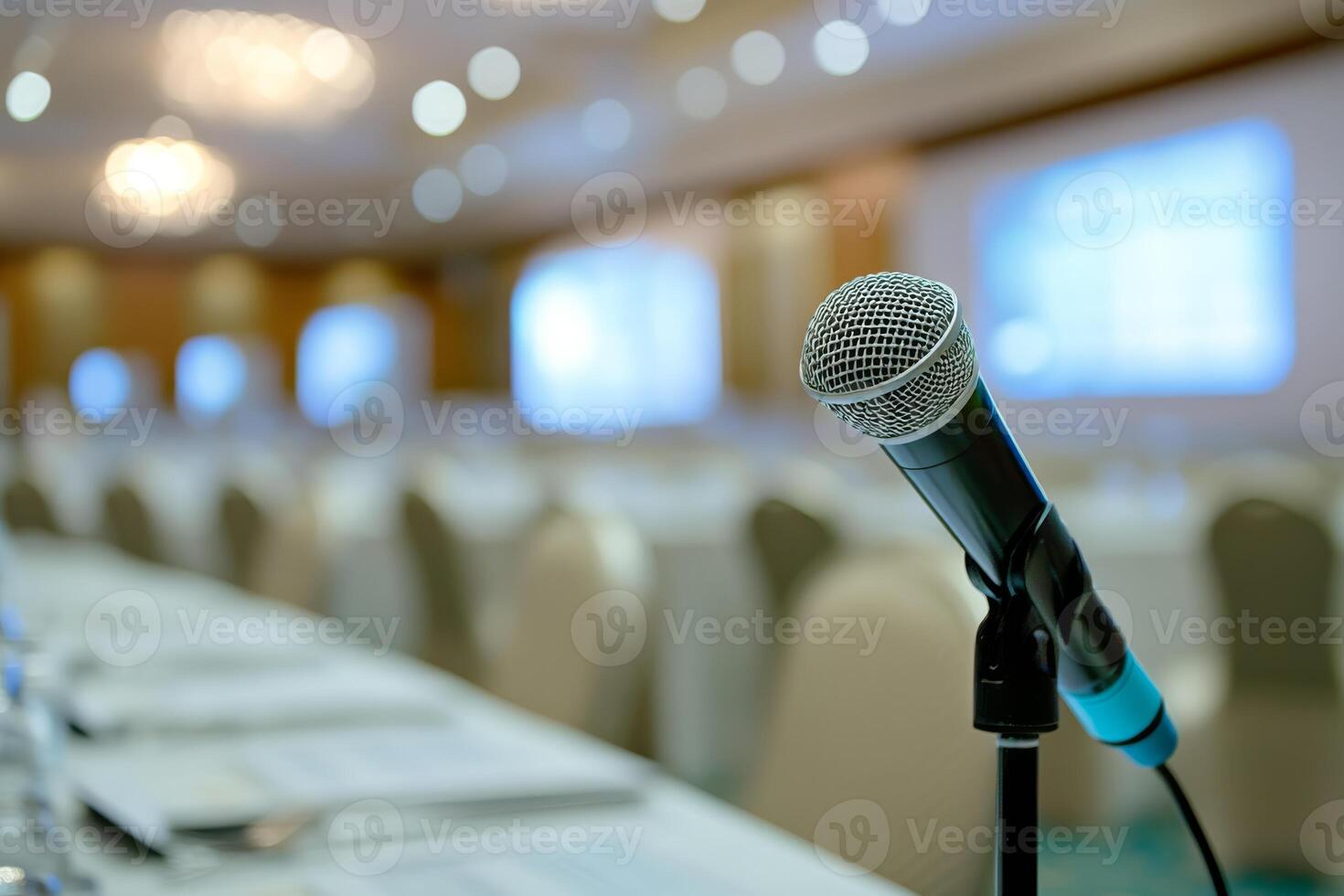 A closeup of a microphone at a conference table symbolizes vital global discussions on IT ethics, emphasizing the need for international cooperation and collaboration to tackle these challenges photo