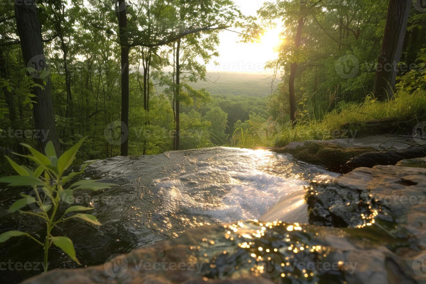 Behold a breathtaking forest waterfall, descending over rocks, bathed in the warm glow of a stunning sunset photo