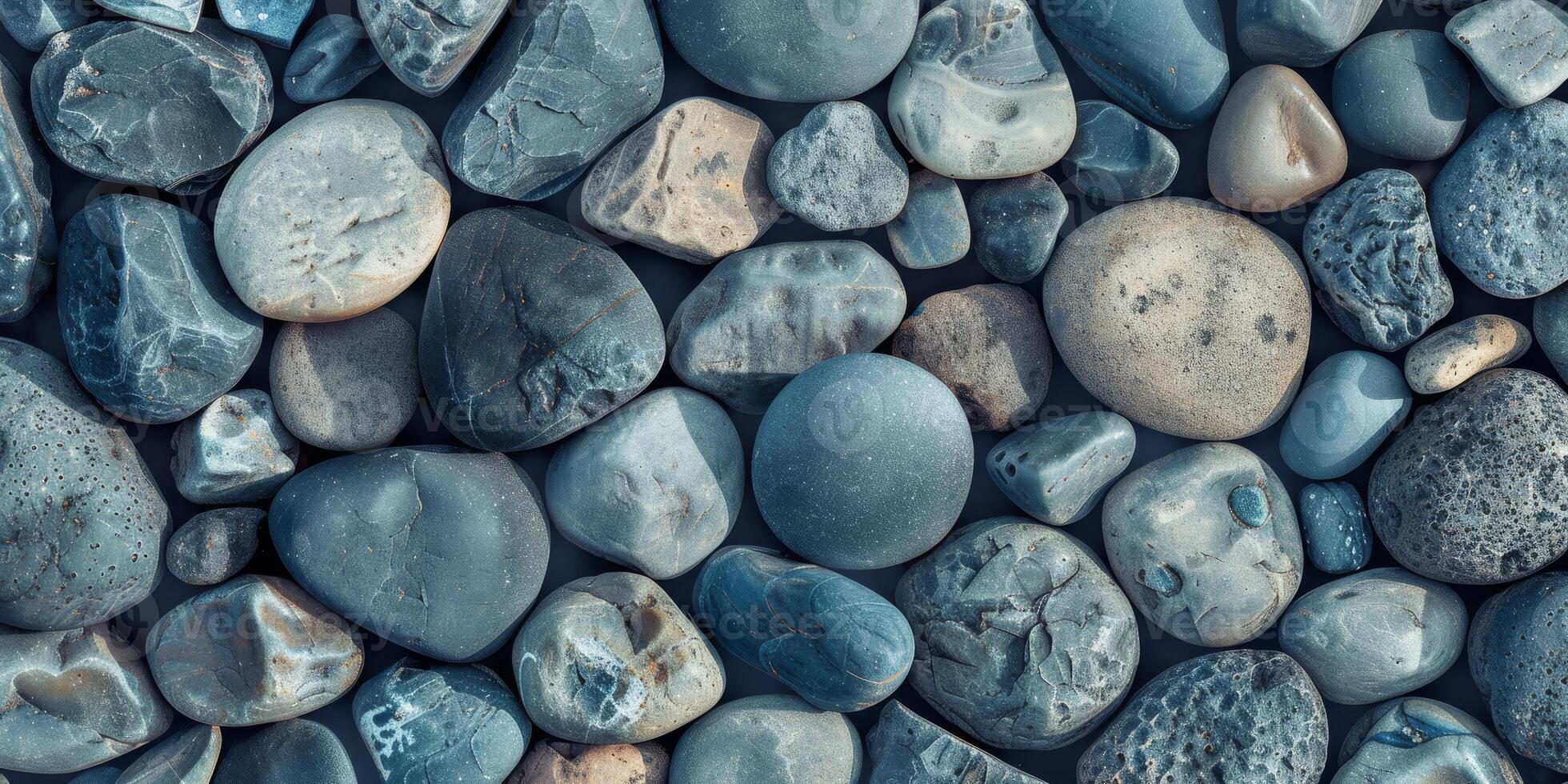 A captivating array of smooth beach stones with varying shapes and colors, showcasing nature's beauty. photo