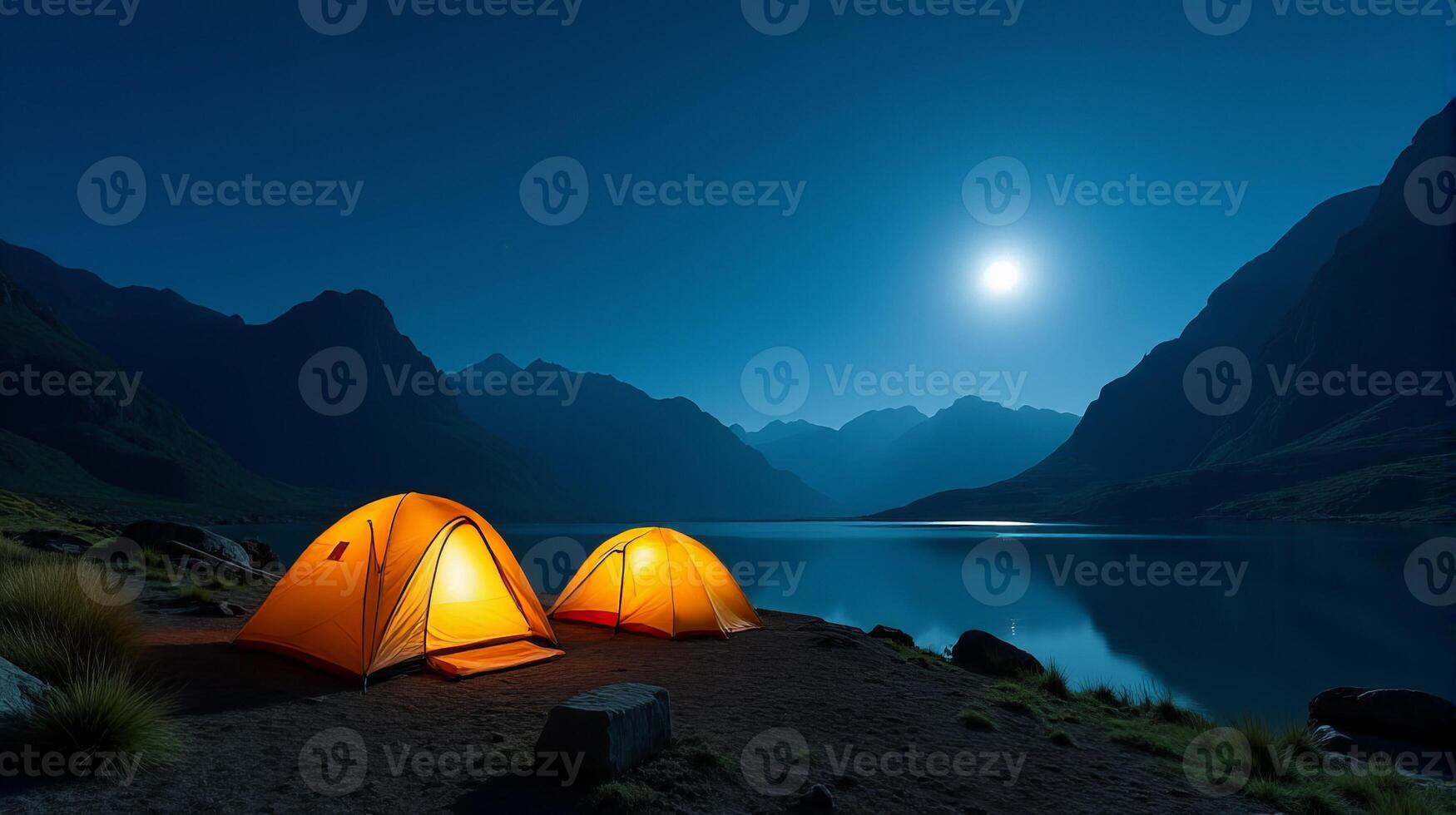 Serene Night-time Camping Scene in the Mountains. Clear Starry Sky With a Bright Full Moon Illuminating Landscape. photo