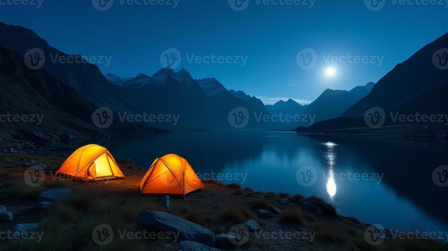 Serene Night-time Camping Scene in the Mountains. Clear Starry Sky With a Bright Full Moon Illuminating Landscape. photo