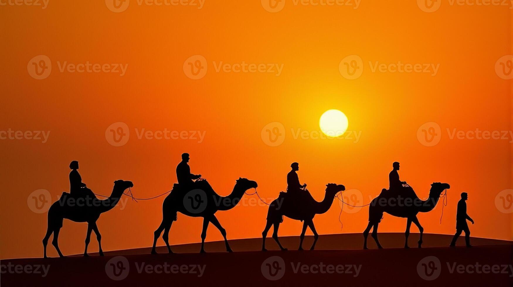 Silhouette of Camel Riders Against an Orange Hued Sky on a Desert Dunes Under Dramatic Sunset photo
