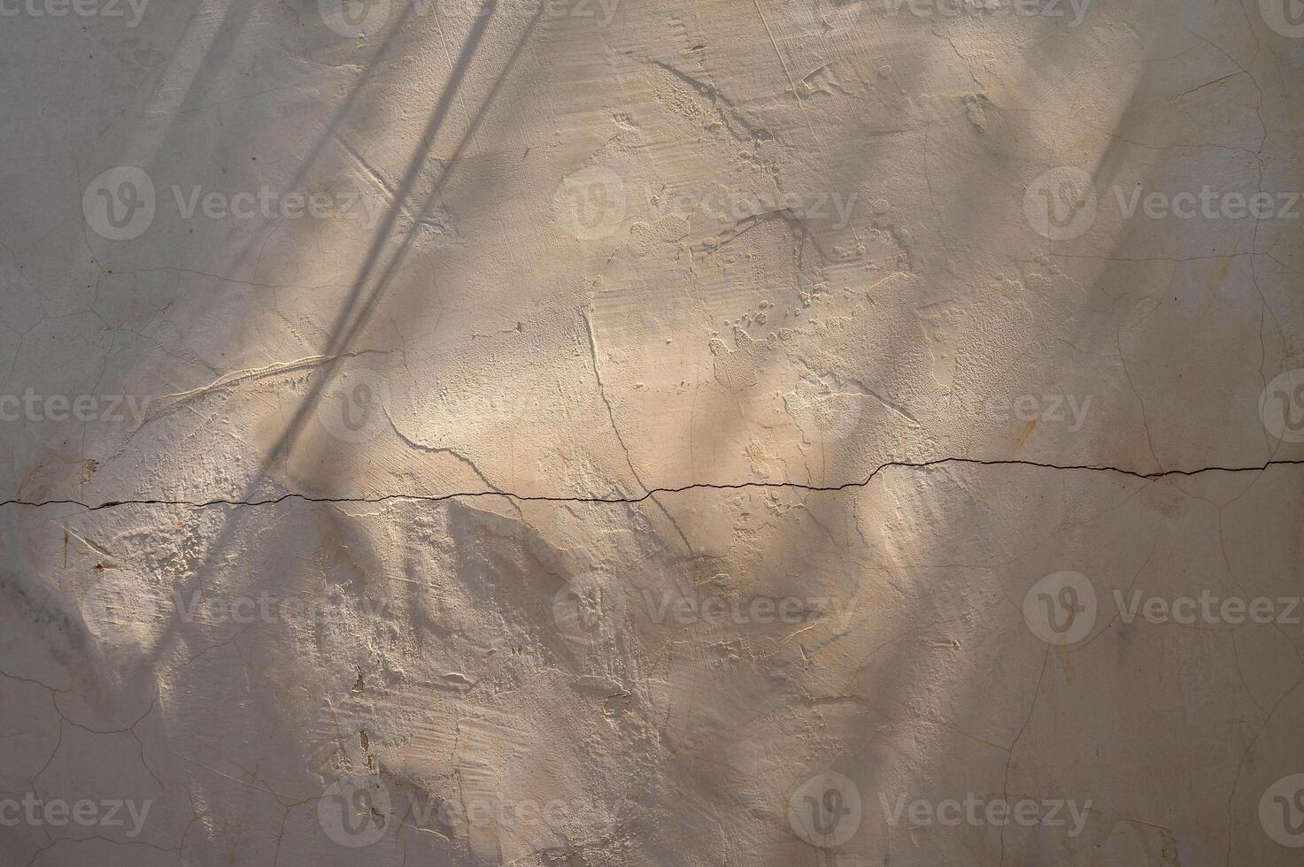 Fashionable photography effect of sunlight reflection on a yellow background for overlay, shadow of plant branches photo
