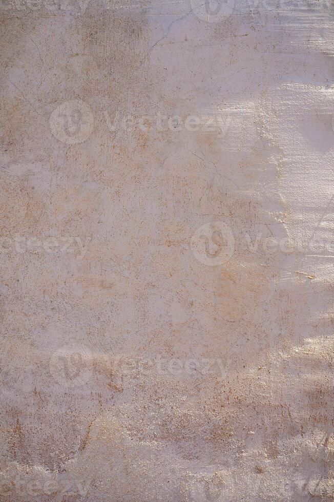 Blurred dreamy surreal rainbow light refraction texture overlay effect on wall photo