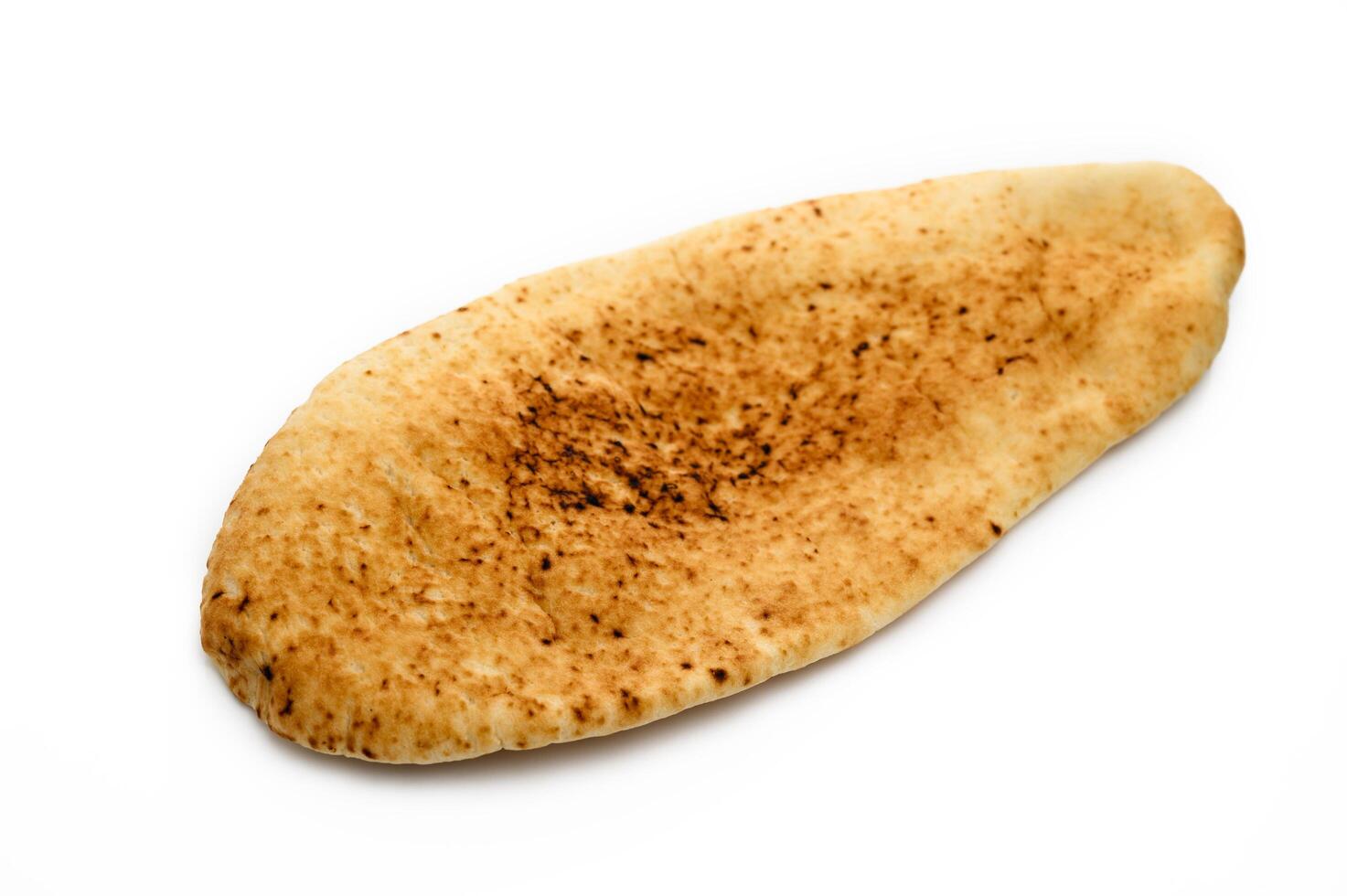 Fresh pita bread close up isolated on white background photo