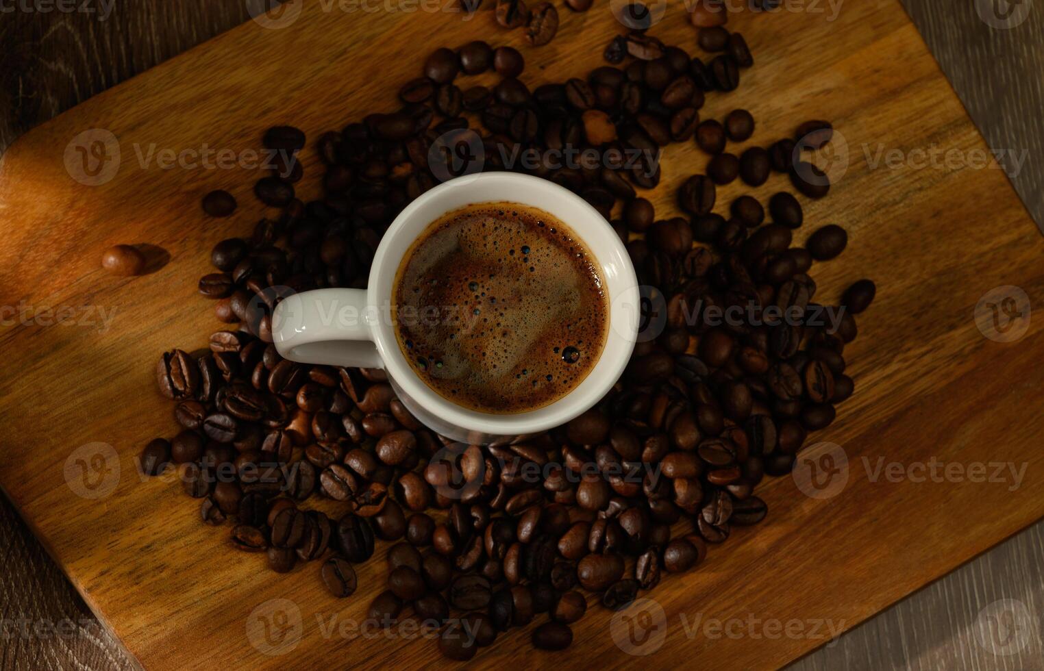 Traditional Turkish coffee cup on a wooden table photo