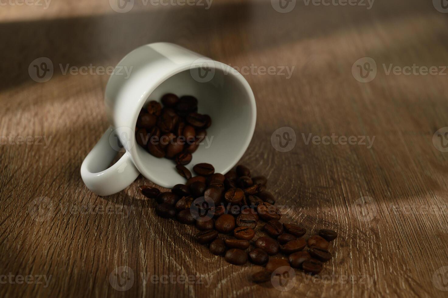 coffee cup and coffee beans on the table photo