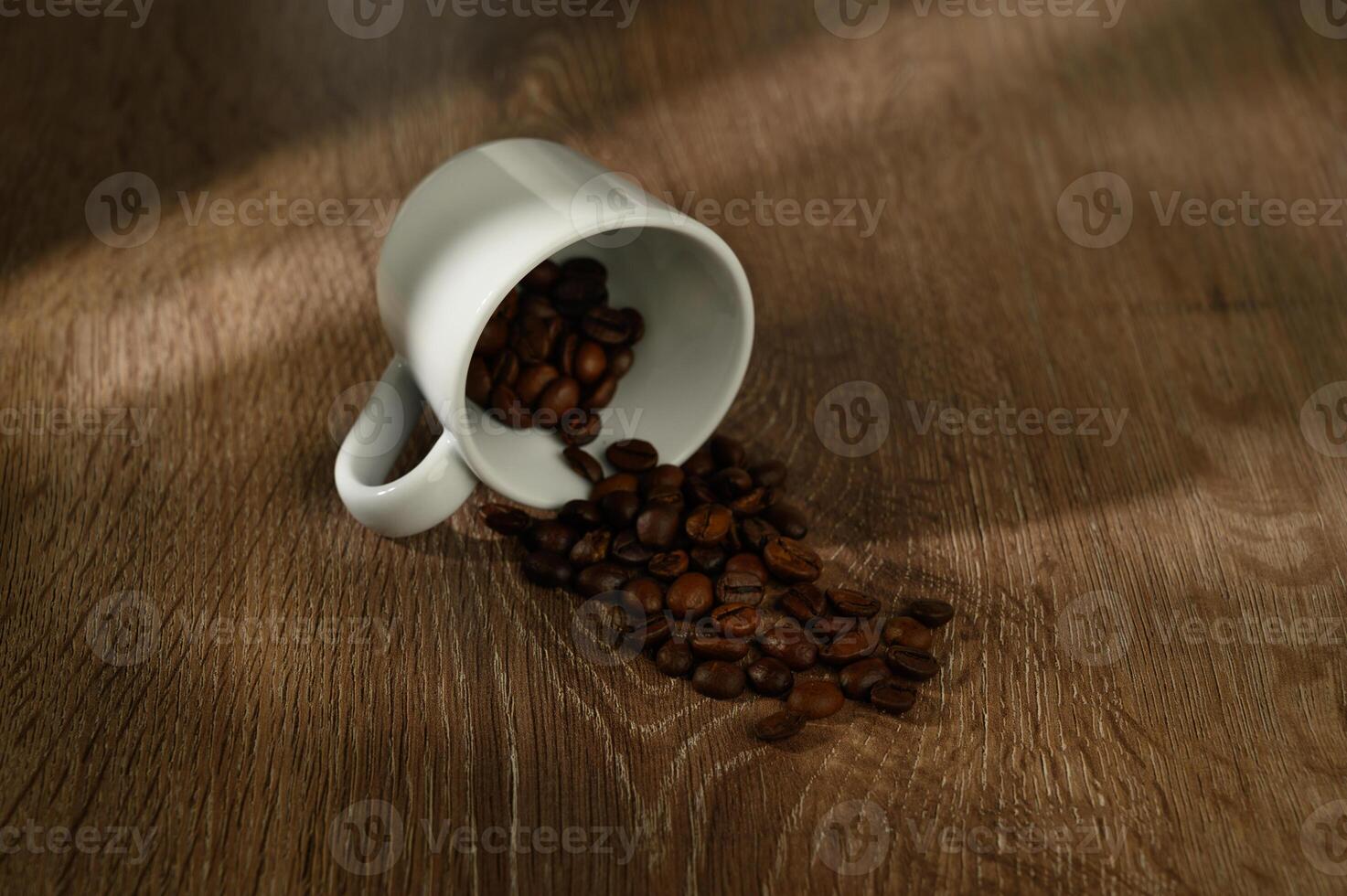 coffee cup and coffee beans on wooden table photo