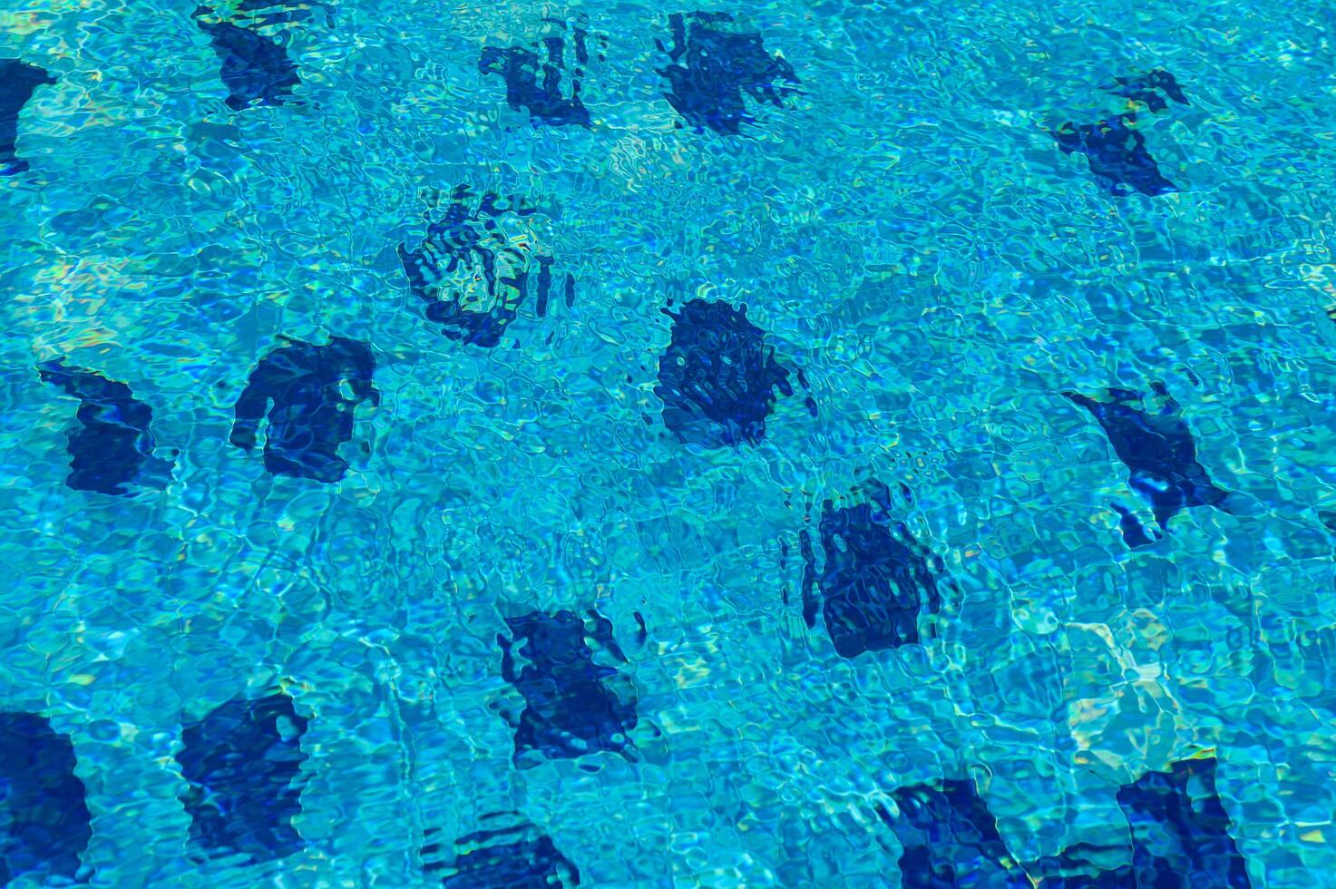 Beautiful sun reflections of water in the pool. Summer. Flight holidays photo