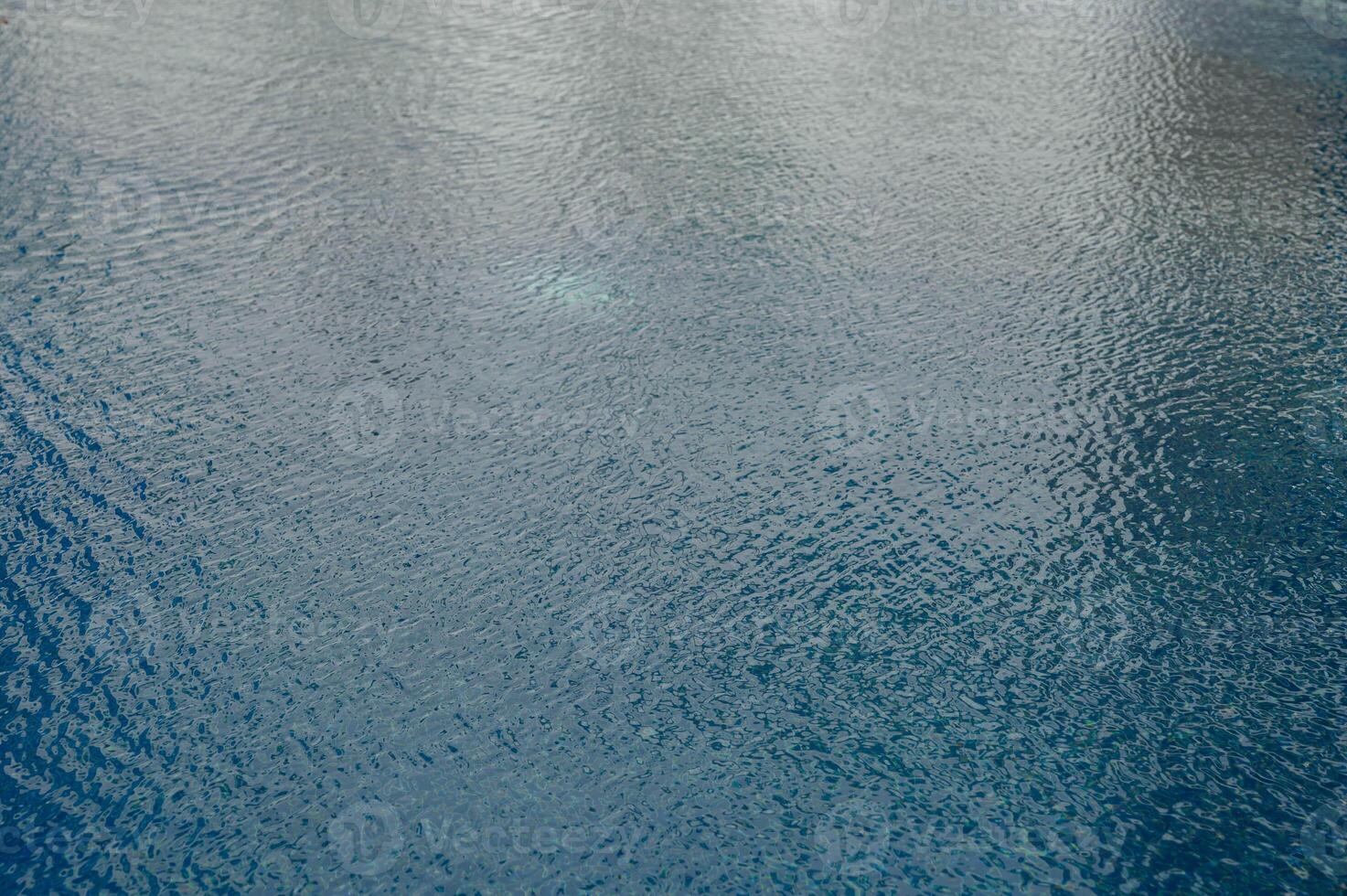 blue water in swimming pool background photo