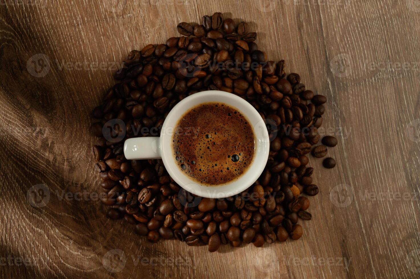 Coffee cup bean close up on natural wooden background. Morning breakfast concept 2 photo