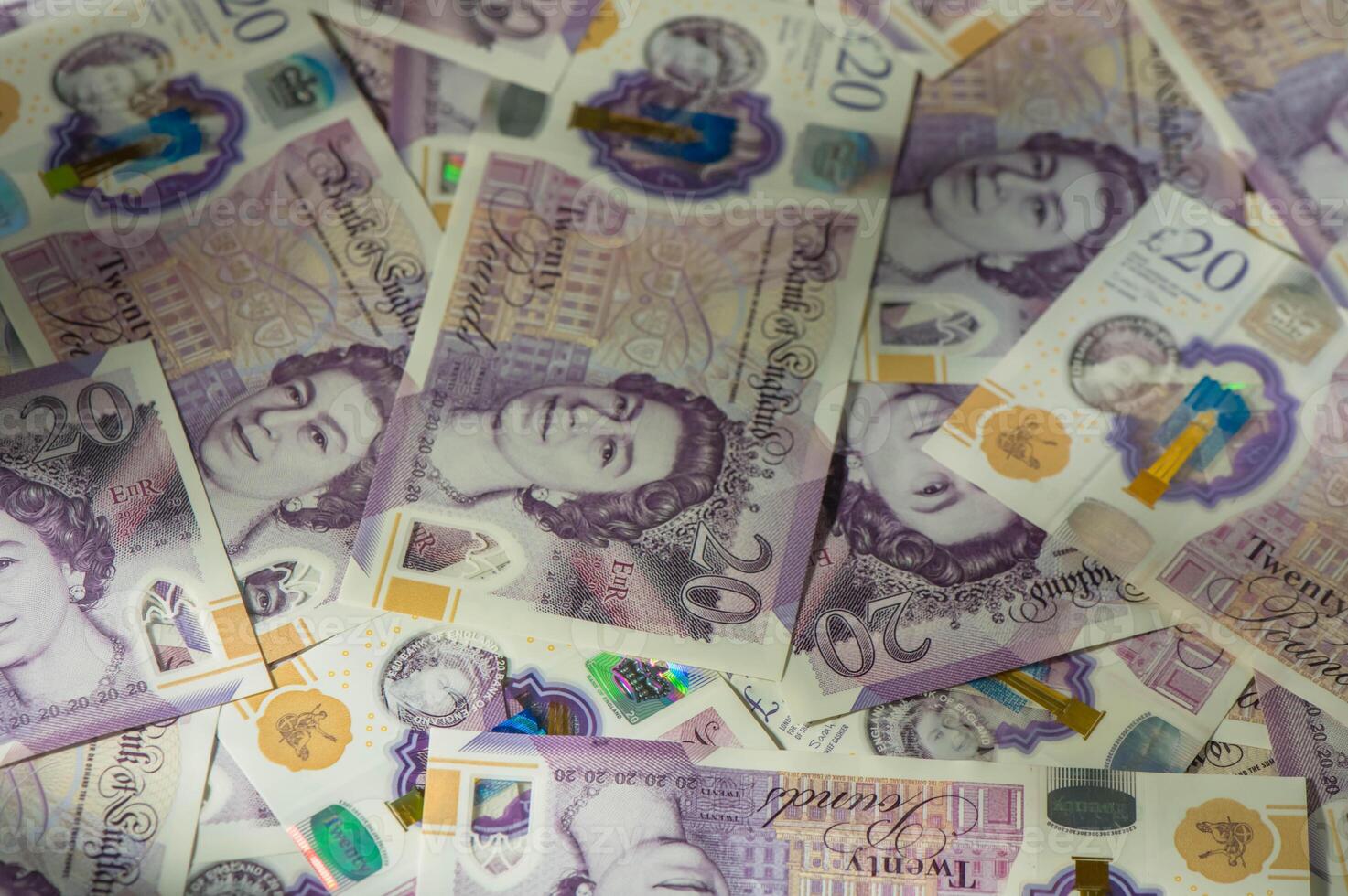 British currency - close up of the new 2016 polymer five pound note with enhanced counterfeit resilience. 1 photo