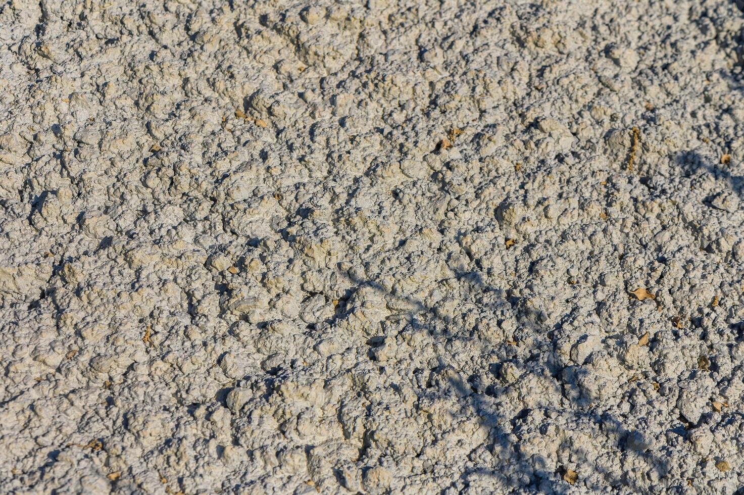 hardened concrete mortar at a construction site photo