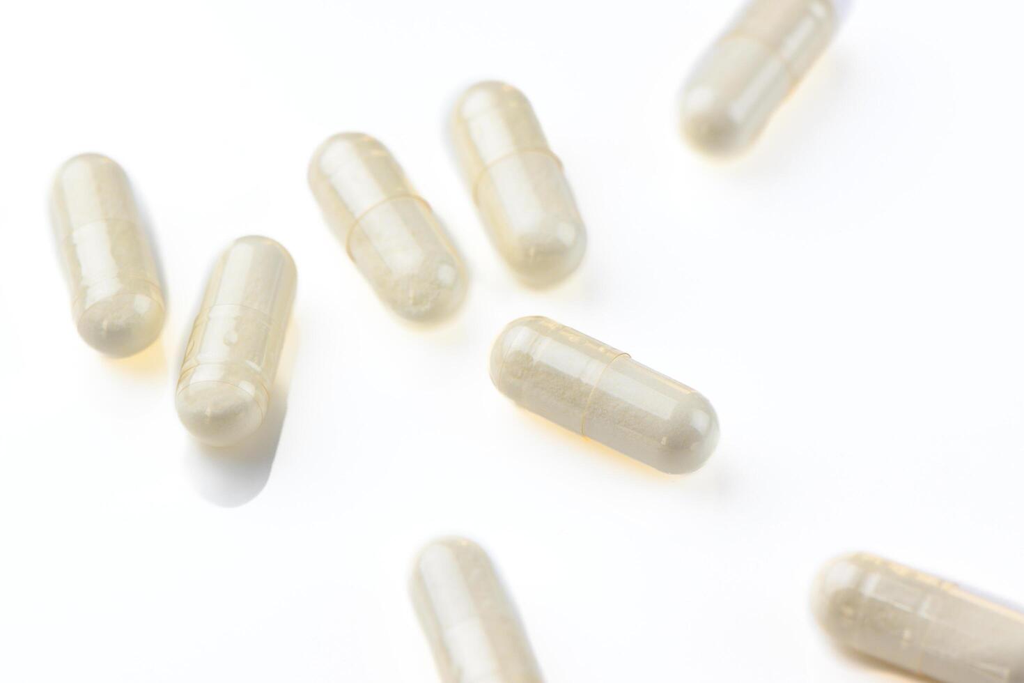 useful capsules with medicine painted in studio filming 4 photo