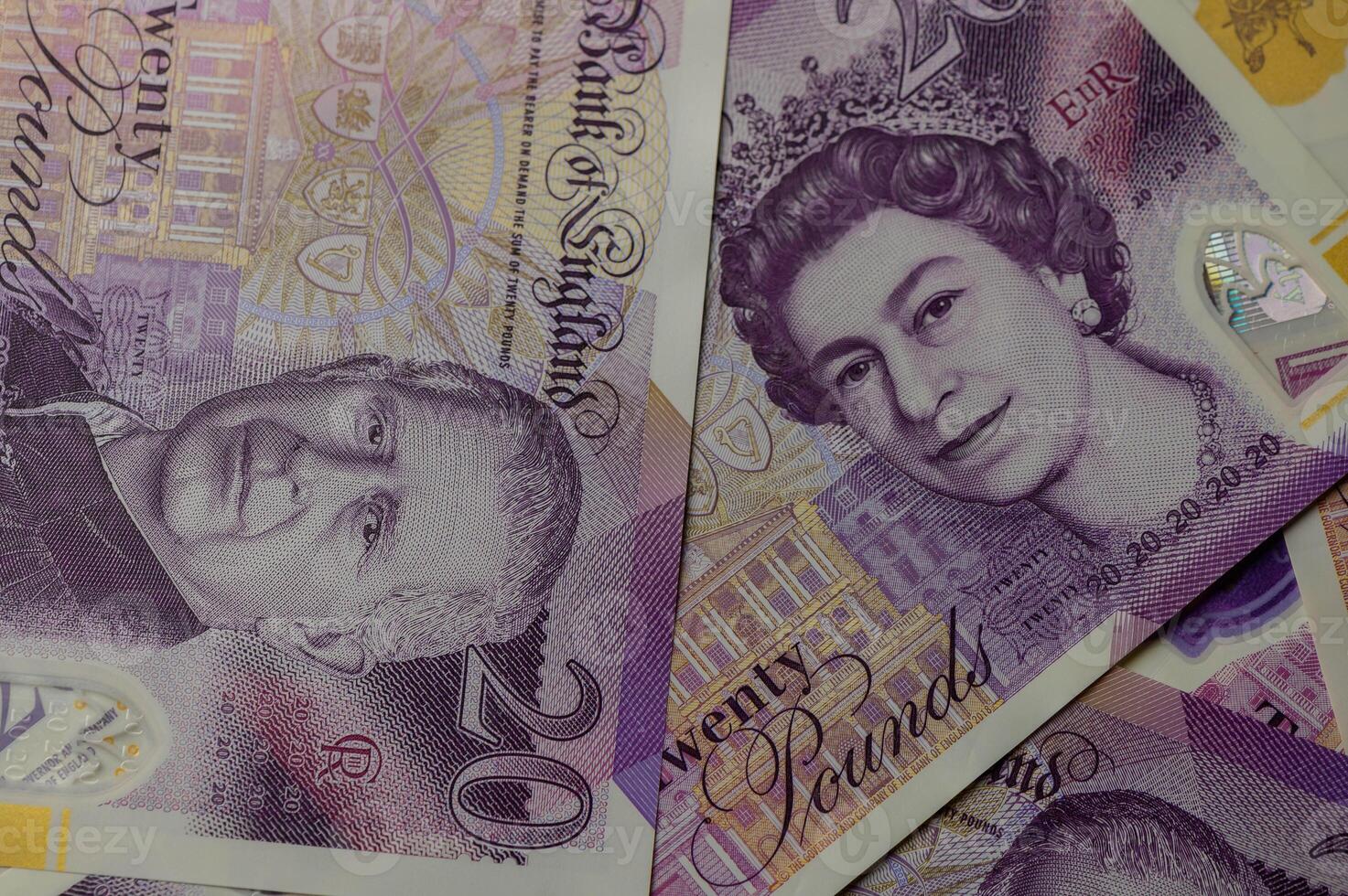 20 pound sterling bank notes closeup view business background 1 photo