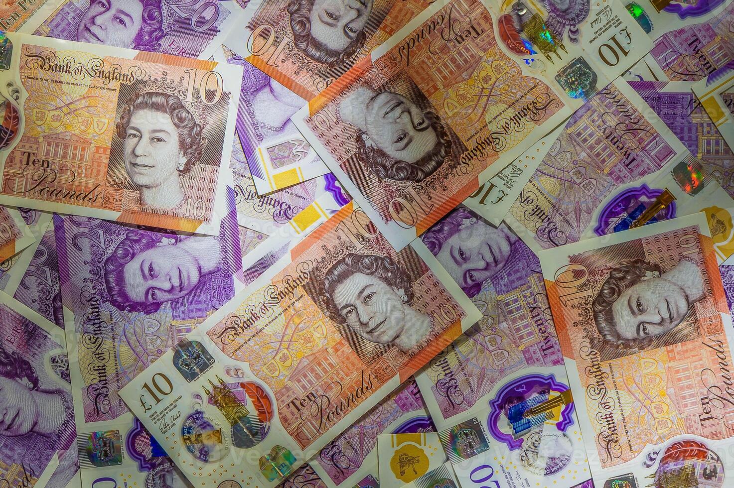 Extreme close-up polymer ten and twenty pound notes photo