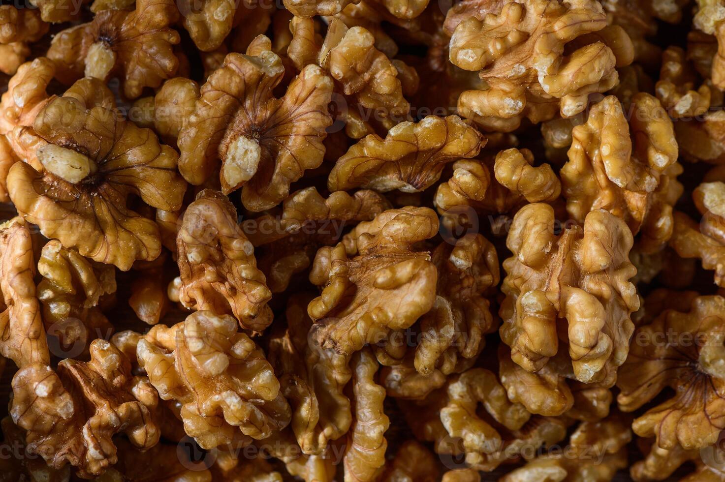 closeup of dried shelled walnut kernels photo