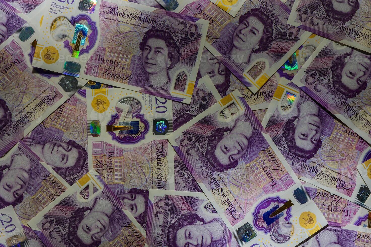 British currency - close up of the new 2016 polymer five pound note with enhanced counterfeit resilience. 2 photo