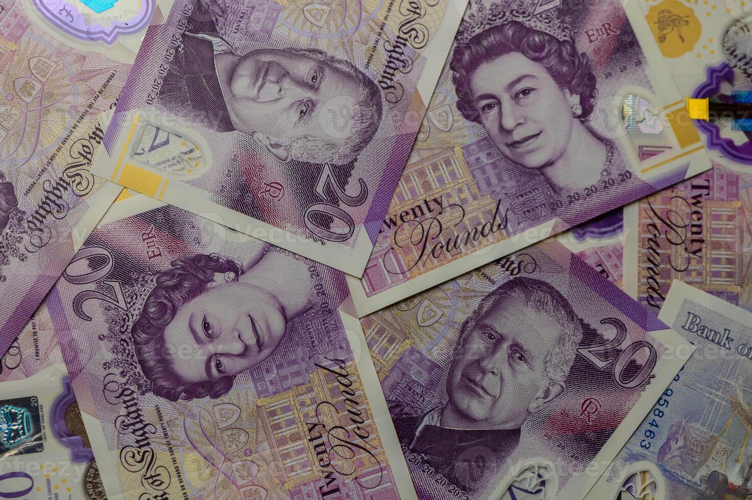 20 pound sterling bank notes closeup view business background 3 photo