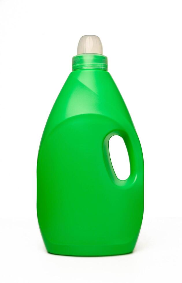 Green bottle with washing powder. Bottle isolate on a white background. photo