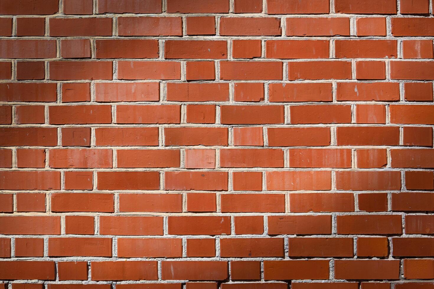 Big full frame background of detailed old red brick wall with copy space photo