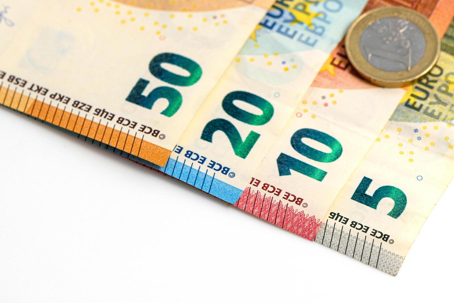 different colorful euro isolated on white background, savings wealth, texture photo