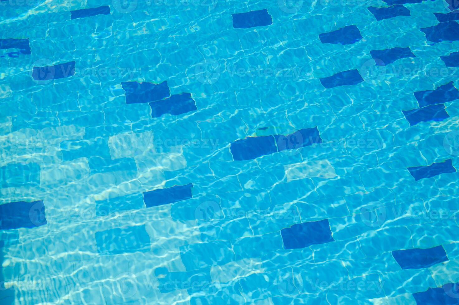 Water Surface Background with Sun Reflections and Seamless Ripples photo