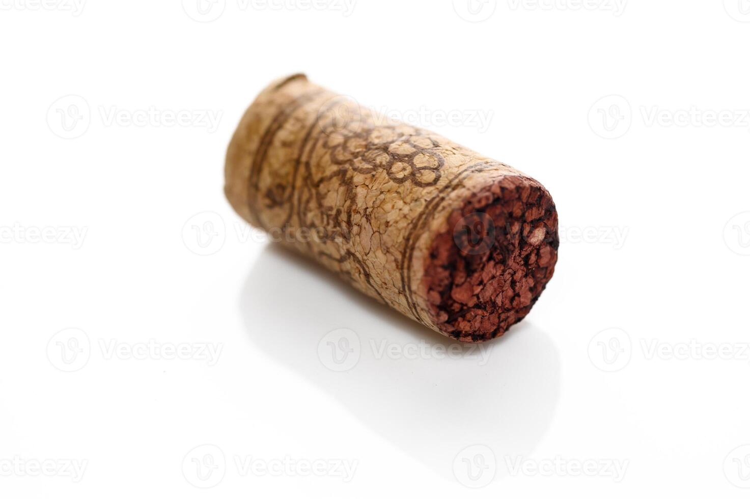 Wine bottle cork Isolated on white background. One Wooden Cork Close up. photo