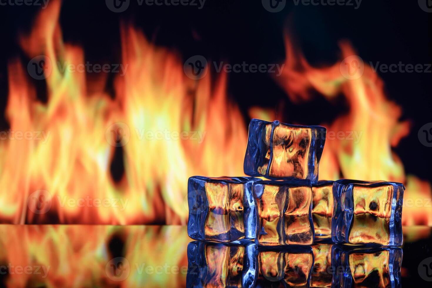 Block of ice with fire inside photo
