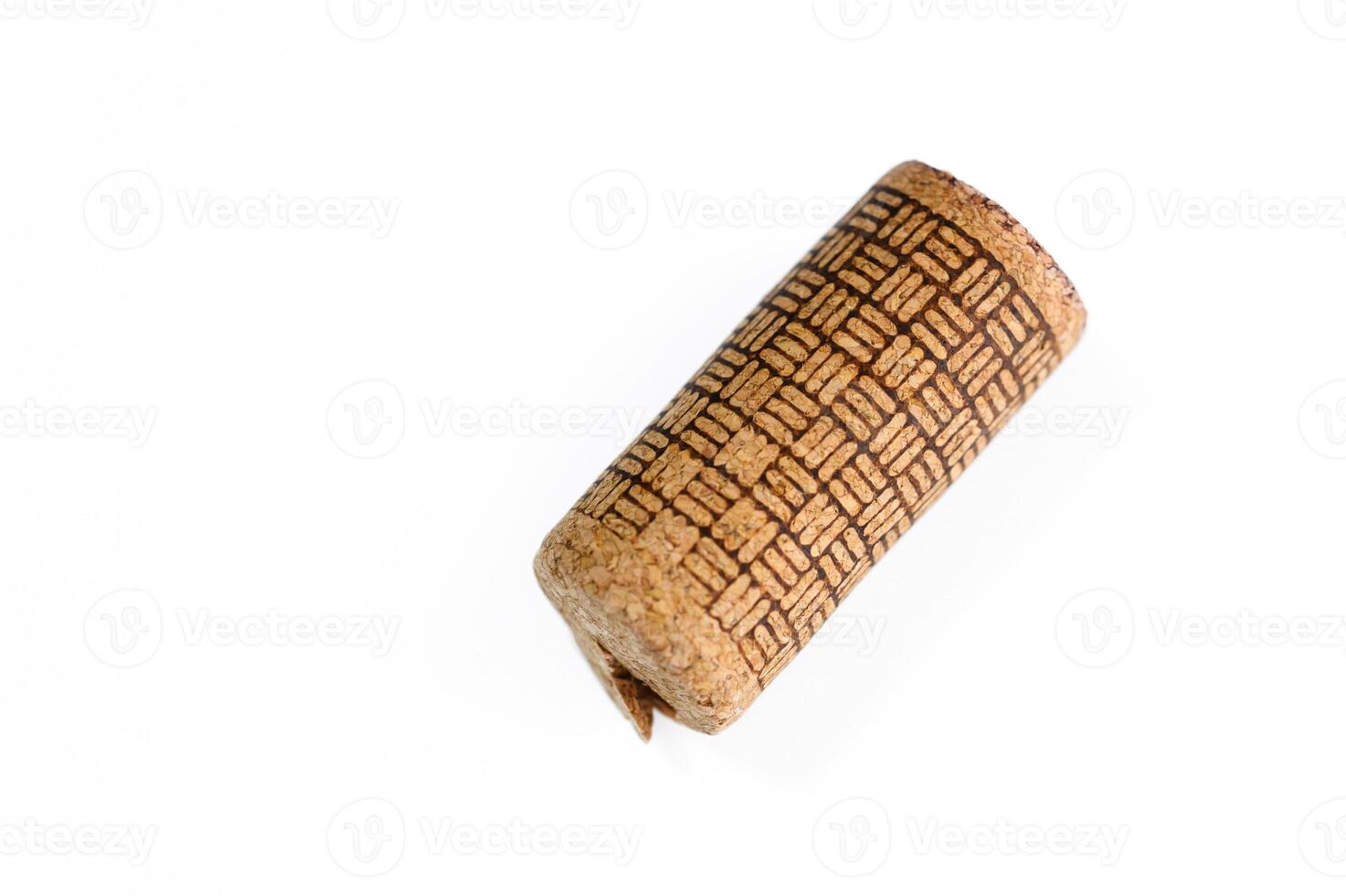 Wine bottle cork Isolated on white background. One Wooden Cork Close up. photo
