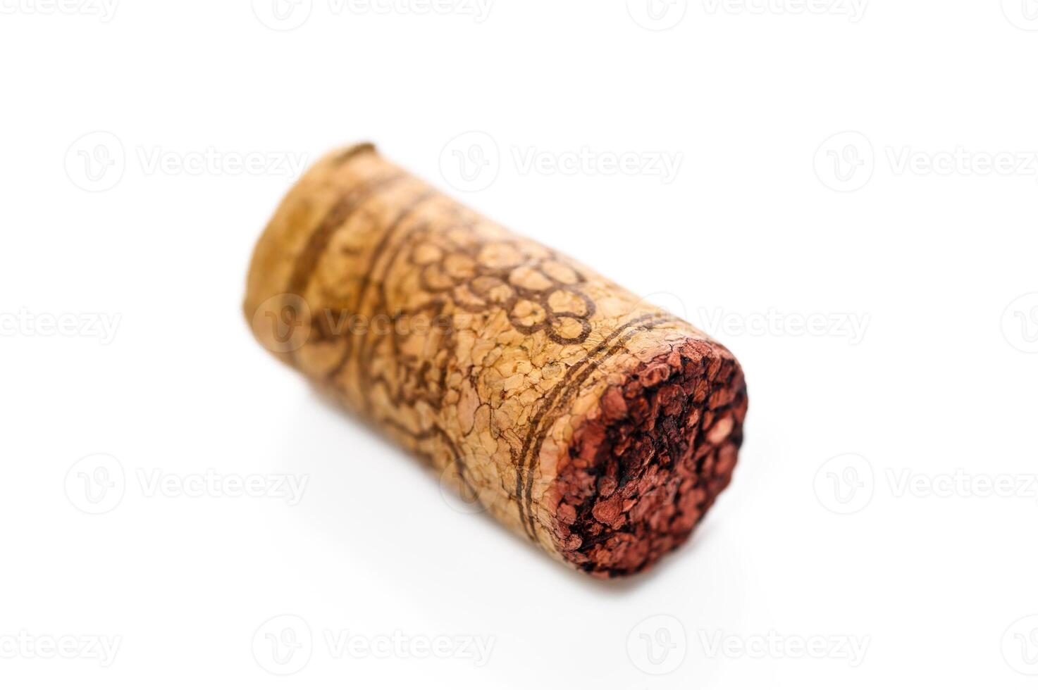Wine bottle cork Isolated on white background. One Wooden Cork Close up. photo