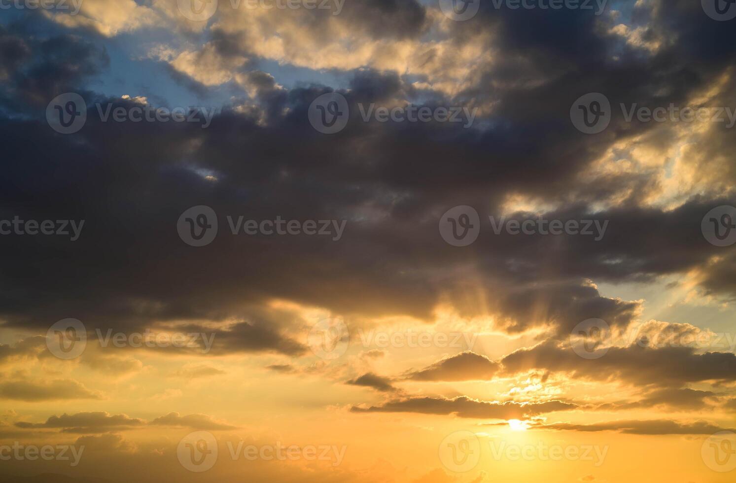 Fiery sunset, colorful clouds in the sky photo