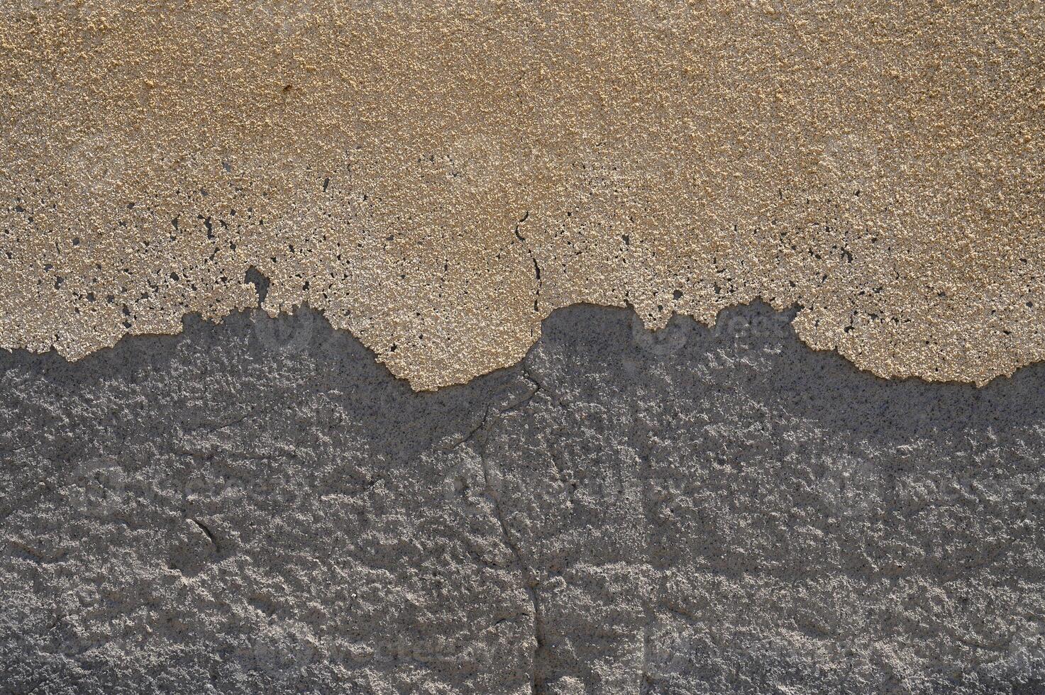 Texture of white plaster on a concrete wall handmade. Construction, interior design photo