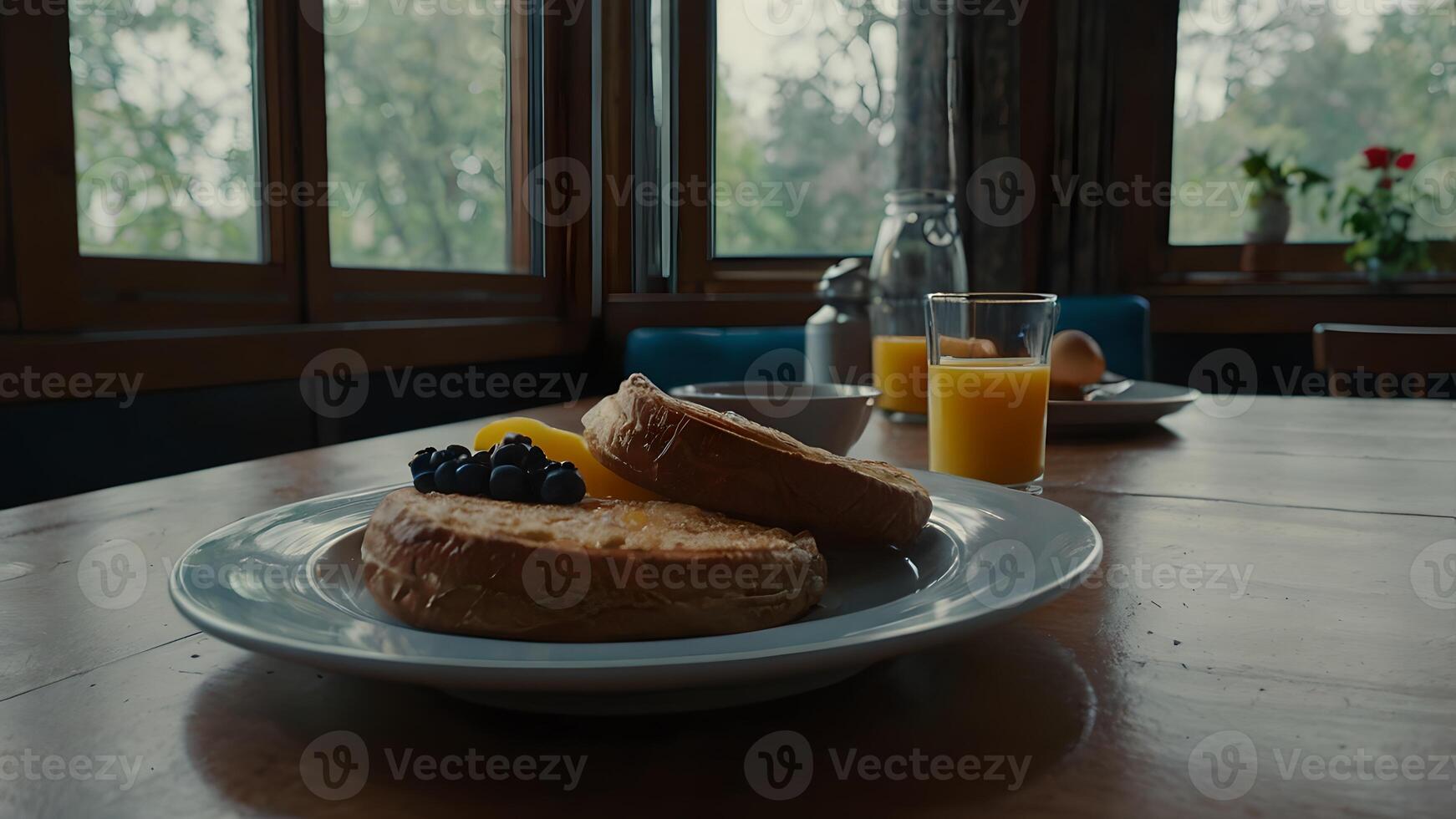 Delicious Breakfast with Fresh Fruit and Orange Juice at a Sunny Table photo
